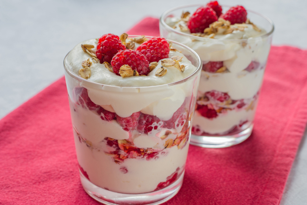 Traditional Scottish dessert made with cream, oats. honey and raspberries