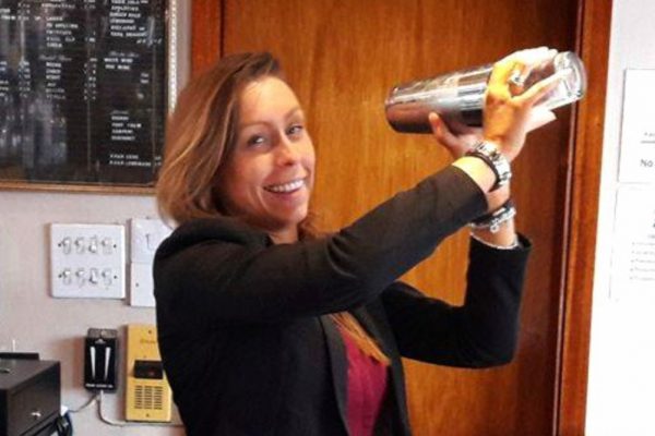 Our hotel bar staff, a girl making cocktails