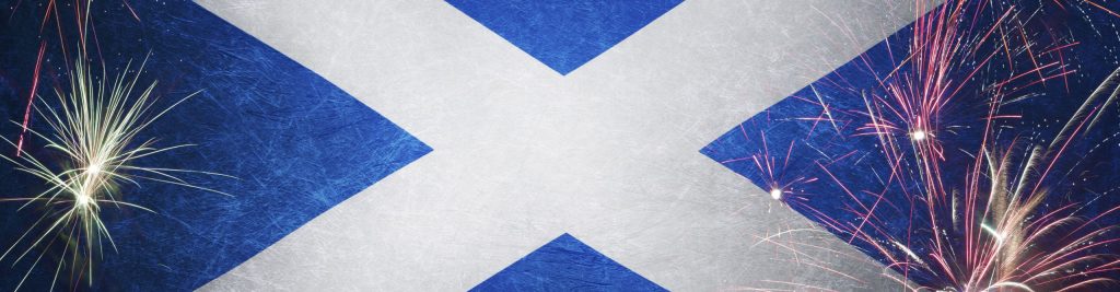 The Scottish flag with fireworks across the sides