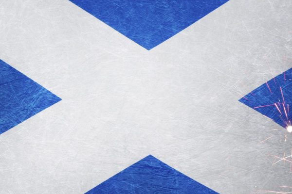 The Scottish flag with fireworks across the sides
