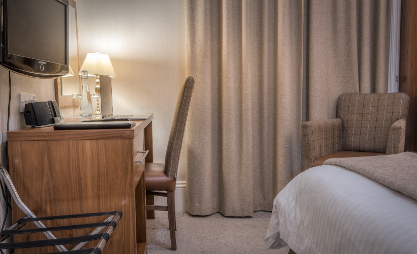 A photo of the vanity desk and lamp in the Mackay's Hotel double and twin hotel bedrooms in Caithness