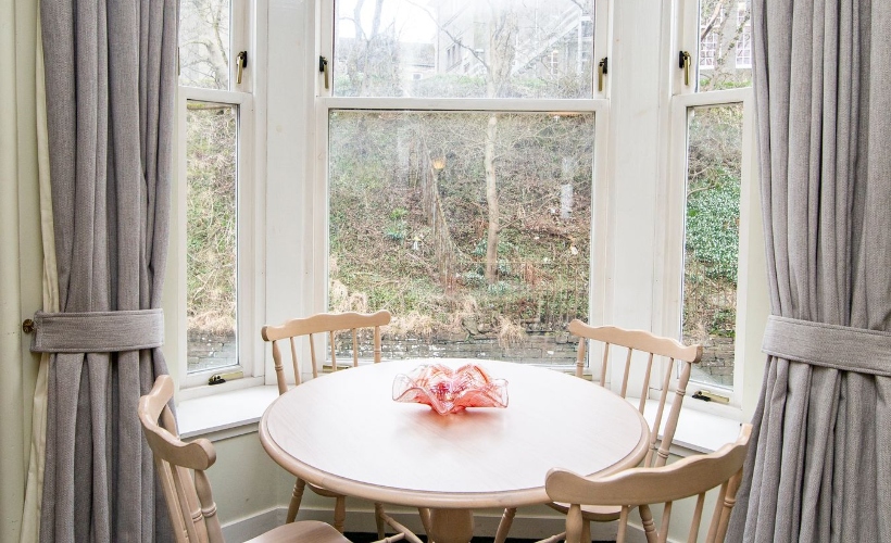 Self catering accomodation in wick, here is our apparment three dining table in the bay window