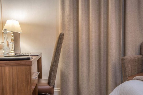 The desk in a Double Room in Mackays Hotel in Wick