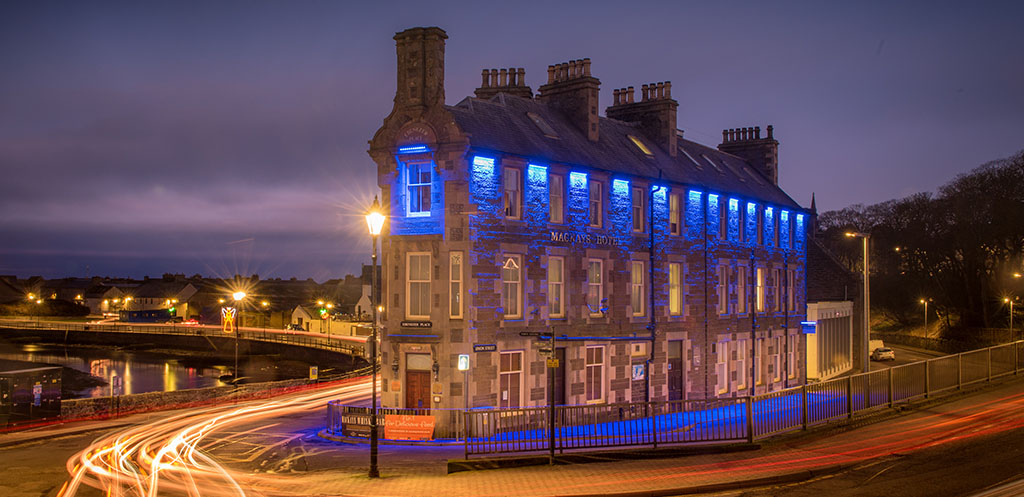 Mackays hotel lit up at night