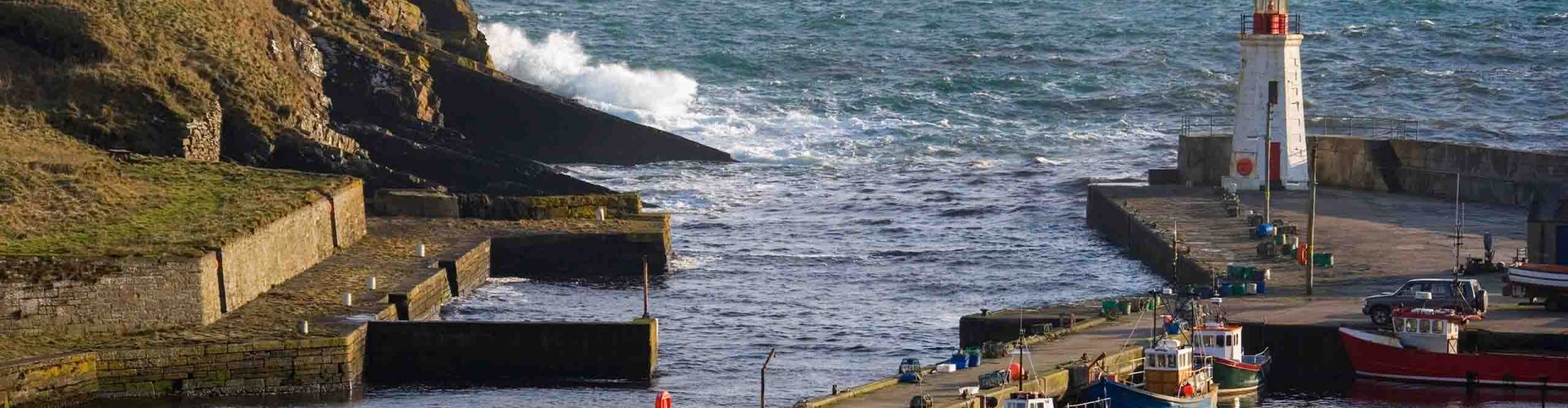 Lybster Harbour with waves crashing