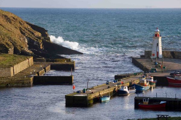 Lybster Harbour with waves crashing