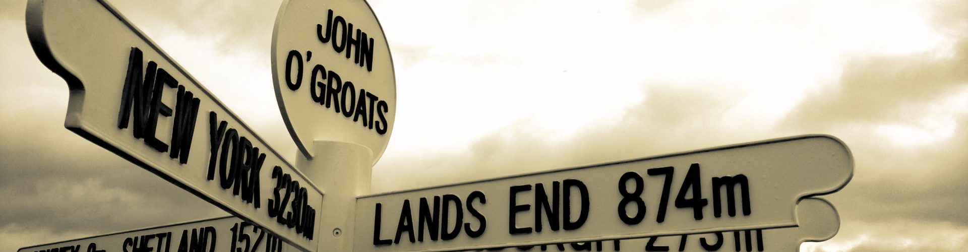 Sign at John O'Groats showing distance to Lands' End