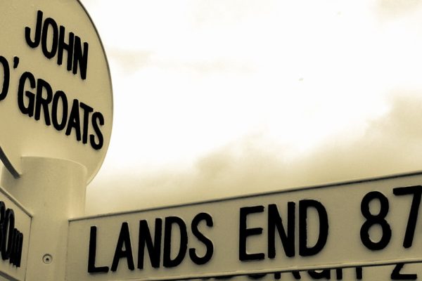 Sign at John O'Groats showing distance to Lands' End