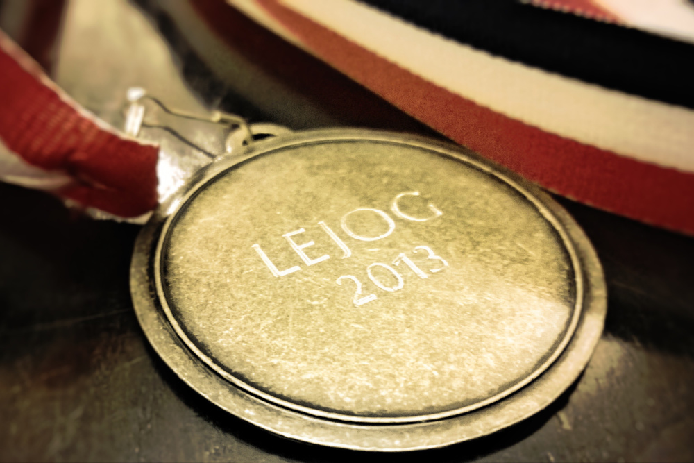 A medal engraved with LEJOG 2013