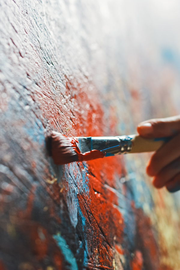 Artist painting on a canvas