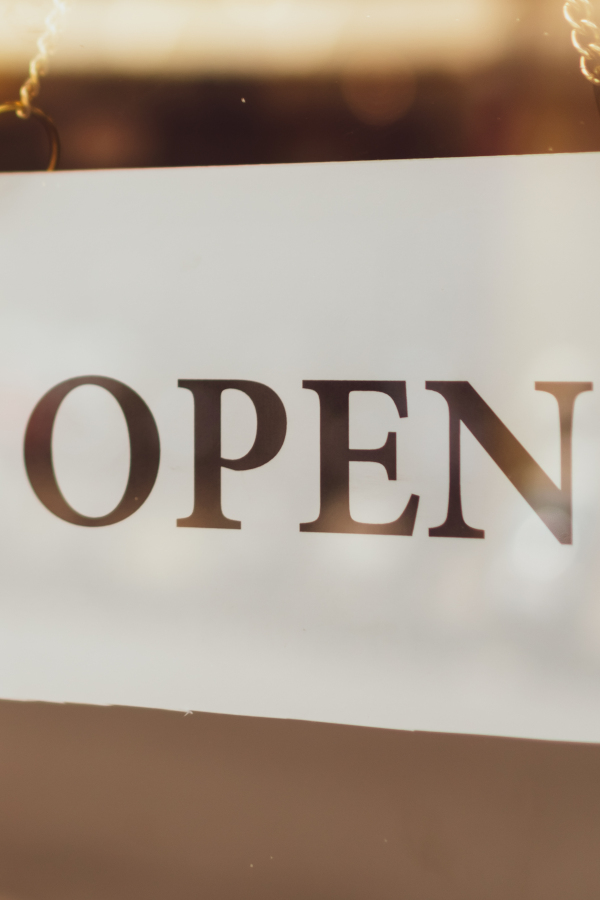 An open sign in a shop window