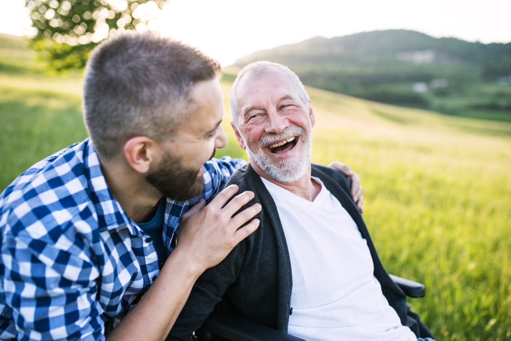 Happy father and son outside