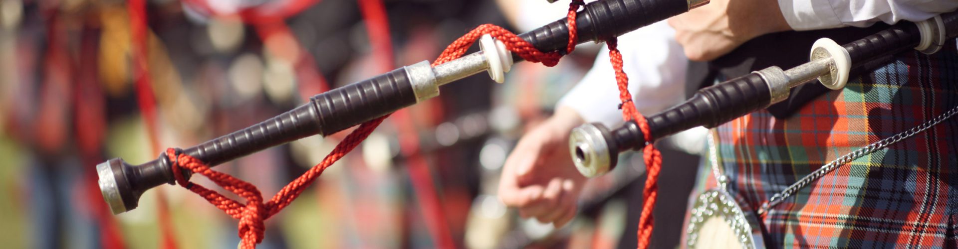 Pipe band at a Highland Games event