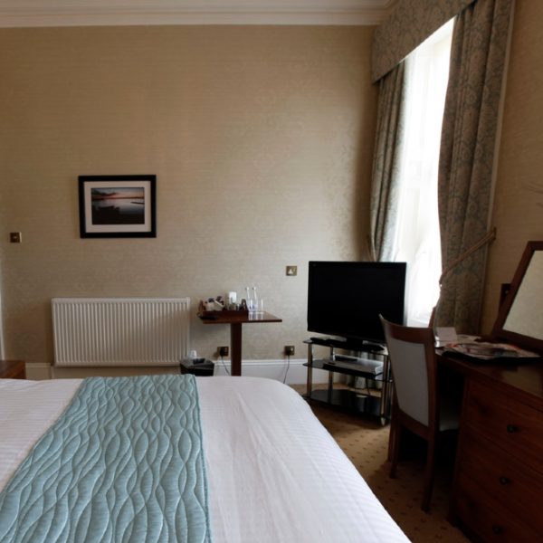 Interior photo of a Mackays superior room showing the desk area