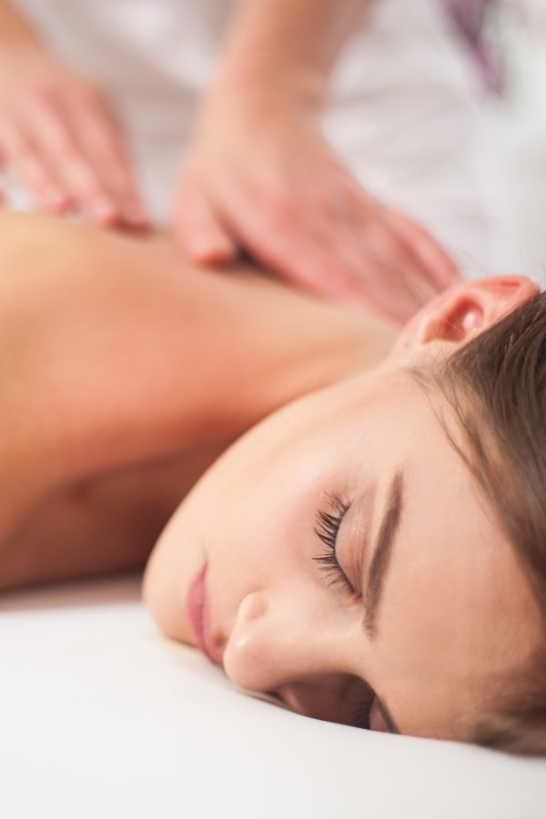 Woman enjoying a back massage